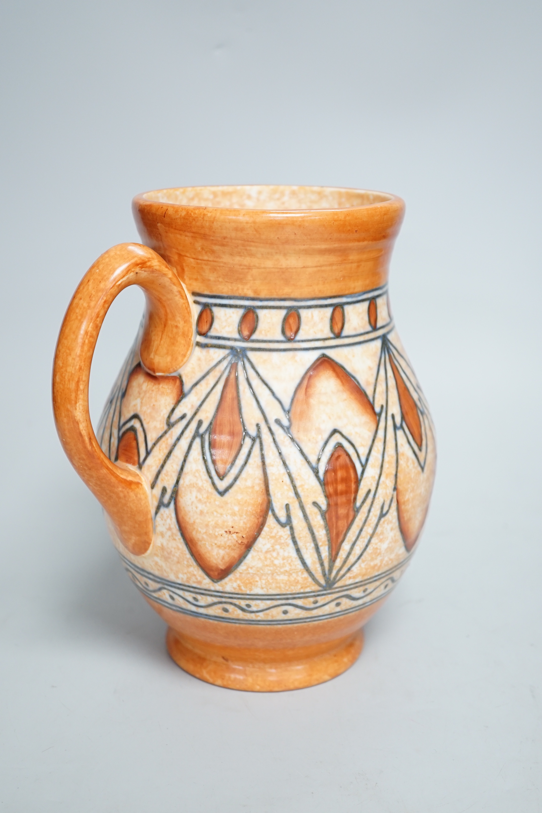 A Charlotte Rhead for Crown Ducal ceramic jug, with stylised design, signed and numbered to the base, 21cm high